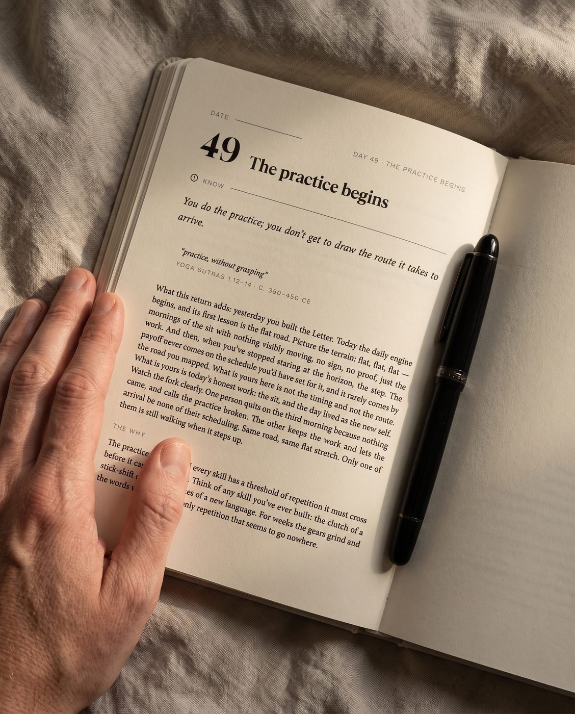 A hand writing the morning page by hand