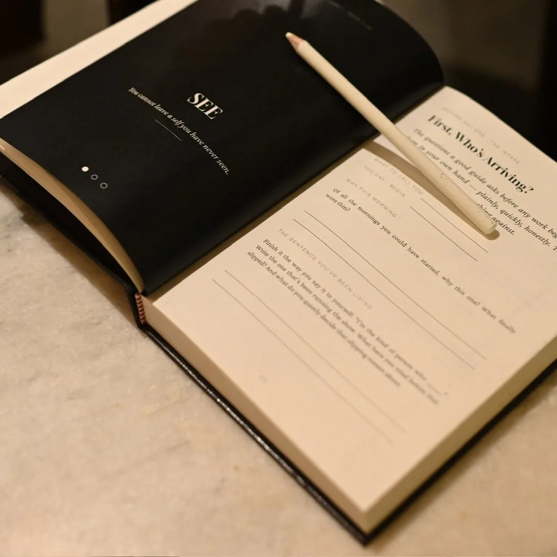 The journal open at the SEE divider and its first page.
